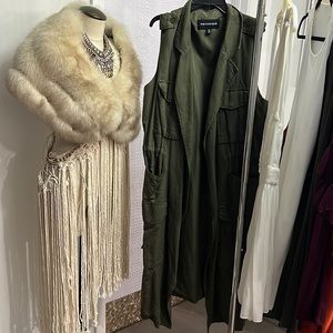 Cotton fully lined long vest with drawstring for gathering at waist.